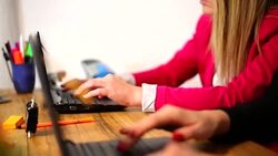 Women working together Stock Footage