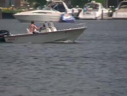 MS TS Boats passing through lake / Minneapolis, Minnesota, United States  Stock Footage