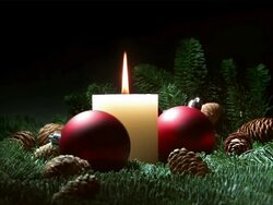 Christmas candle and red baubles Stock Footage