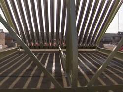 Medium Long Shot tilt,up , Glass tubes form a solar panel. / China Stock Footage