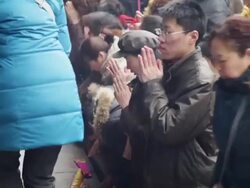 MS Pilgrims pray for good luck during Chinese Lunar New Year at Taoist temple AUDIO / xi'an, shaanxi, china Stock Footage