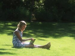 SLO MO WS Young woman using laptop in garden, Lehi, Utah, USA Stock Footage