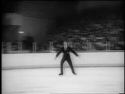 B/W 1965 zoom in Scott Ethan Allen figure skating at World Championships / Colorado / newsreel Stock Footage