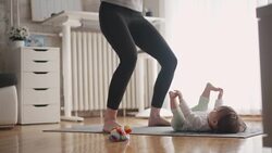 4K: Mother Exercise With Her Baby At Home. Stock Footage