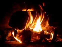 Flaming Logs in Fireplace Closeup- Loopable Stock Footage