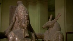 A museum exhibit features Ancient Egyptian statues. Stock Footage