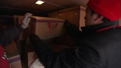 Employees unload boxes of fireworks at the He Wei warehouse in Beijing. Stock Footage