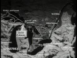 1936: MAP: Map of Great Lakes, surrounding major cities, arrow pointing to 'Soo Canal.' Instructional Video