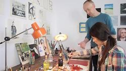 Female artist guided by his teacher in the workshop. Stock Footage