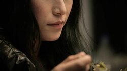 Close-up of Asian girl enjoying tasty and healthy food. Stock Footage