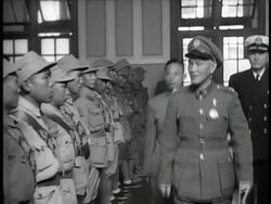 B/W 1940s Chiang Kai-Shek in uniform inspecting troops / China / documentary Stock Footage
