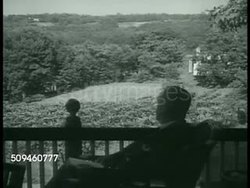 1938: HUDSON RIVER VALLEY: Howland Spencer in estate home on Hudson River, sitting on porch. XWS Roosevelt home across river. MS Spencer having sign nailed in property: 'Crum Elbow Private No Trespassing' XWS Land. Spencer talking on telephone. Instructional Video