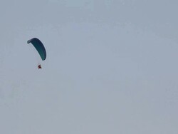Paramotor flying in the sky. Stock Footage