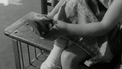 1960 MONTAGE Children taking off shoes and hanging coat on hook at nursery school / United Kingdom Stock Footage