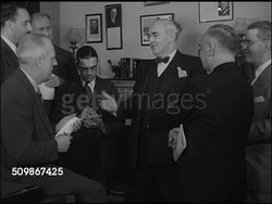 1947: WASHINGTON, D.C.: Chairman of the Senate Foreign Relations Committee Senator Arthur H. Vandenberg (1884-1951) standing in office speaking w/ correspondents (No SOT), reporters taking notes, Vandenberg gesturing w/ hands. Instructional Video