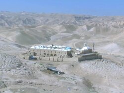 Aerial Nebi Musain in the Judea desert near the Dead sea, Israel Stock Footage