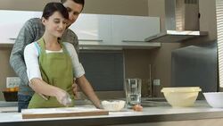HD: Portrait Of Loving Couple In The Kitchen Stock Footage