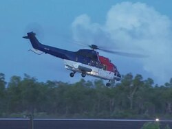 Super Puma helicopter leaving remote airfield in Western Australia, morning Stock Footage