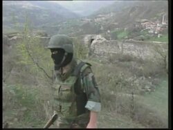 Wrap, new pix of military seizure of rebels' weapons, tanks in area &amp; earlier hillside pix. News Clip