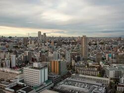 WS T/L View of day to night transition over Ikebukuro district / Tokyo, Japan Stock Footage