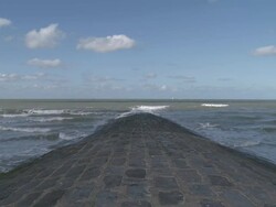 WS View of wave breaker at beach of Ostend / Ostend, Flanders, Belgium / Ostend, Flanders, Belgium Stock Footage