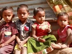 Group of cheerful Rural Indian Children waving at camera Stock Footage