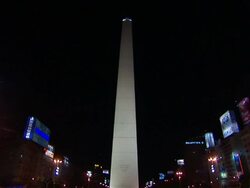 An obelisk shines in the night sky. Stock Footage