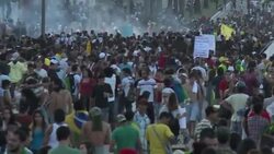 CLEAN : Brazil police protesters clash near News Clip