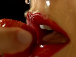HD Super Slow-Mo: Wet Red Lips And Strawberry Stock Footage