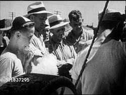 1947: COUNTY FAIR: Males standing in front of young adult male, listening. Blonde girl sucking top of popsicle. 4-H Teen boy talking (No SOT) standing next to cut-a-way model of engine part. Instructional Video