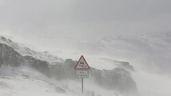Massive snow drifts block the Kirkstone Pass road above Ambleside in the Lake District, UK during the extreme weather event of late March 2013. shot taken on 25th March 2013. Stock Footage
