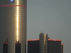 MS TD Shot of General Motors Renaissance Center with sun shining on building / Detroit, Michigan, United States Stock Footage