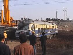 Aftermath of crash that killed 70; wreckage moved from tracks News Clip