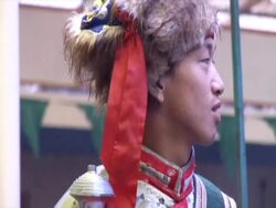 MS Leader of  marching band in Tibetan ceremonial dress AUDIO / Dharmasala, Himachal Pradesh, India Stock Footage
