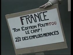 CEO vows to cut debt by two-thirds by end of 2004 News Clip