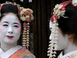 Two beautiful Japanese Geisha girls posing in Tokyo for a Photographer, Japan, Asia Stock Footage