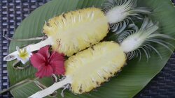 Sliced Pineapple, Frangipani and Hibiscus flower Stock Footage