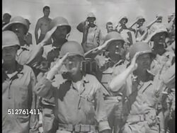 1943: BETIO, TARAWA: RAISING US FLAG: PAN Marines standing at attention, saluting. TU American flag waving next to coconut tree trunk.   (Time-Life War Correspondant Robert Sherrod describes) WWII, World War II. Instructional Video