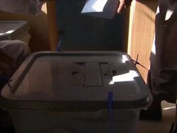 Anonymous Afghan man voting during 2010 elections News Clip