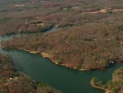 MS AERIAL Shot of houses besides river and forest / South Carolina, United States Stock Footage