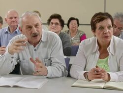 HD: Senior Asking Questions On A Seminar Stock Footage