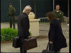 Singer arrives for start of trial, court sketch Instructional Video