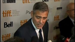 Clooney brings chaos to red carpet at Ides premiere News Clip