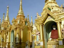 MS Shot of golden shrines with nat figures in shwedagon pagoda / Yangon, Yangon Division, Myanmar Stock Footage