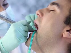Young man in dentist office Stock Footage