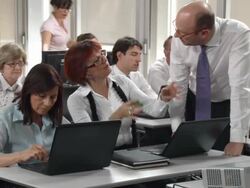 HD: Businesswoman Participating Financial Software Course Stock Footage