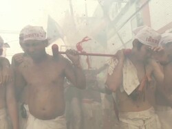 Firecrackers explode on Devotees at Phuket Vegetarian Festival Stock Footage