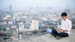 Young business man using laptop Online shopping with smart phone Stock Footage