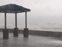 Large waves crash over sea wall as typhoon Megi or Juan hits coast, NE Luzon, Philippines Oct 2010 / AUDIO Stock Footage