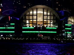 MS Reflection of lights on water at night / Hong Kong, Hong Kong, China Stock Footage